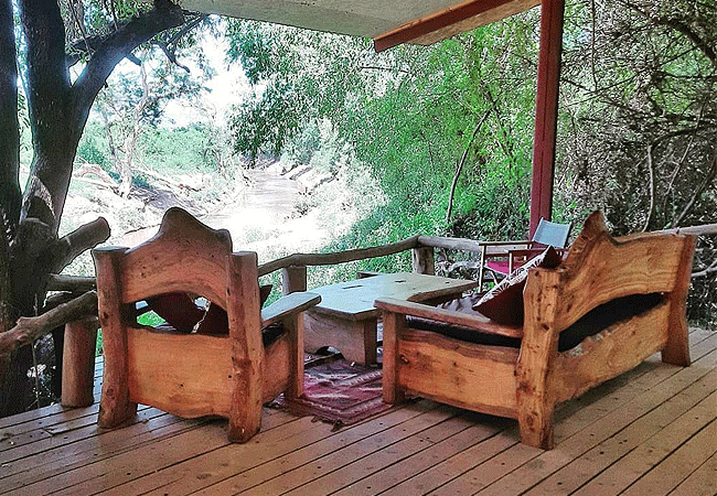 shompole wilderness camp view up the river from the tent chill area